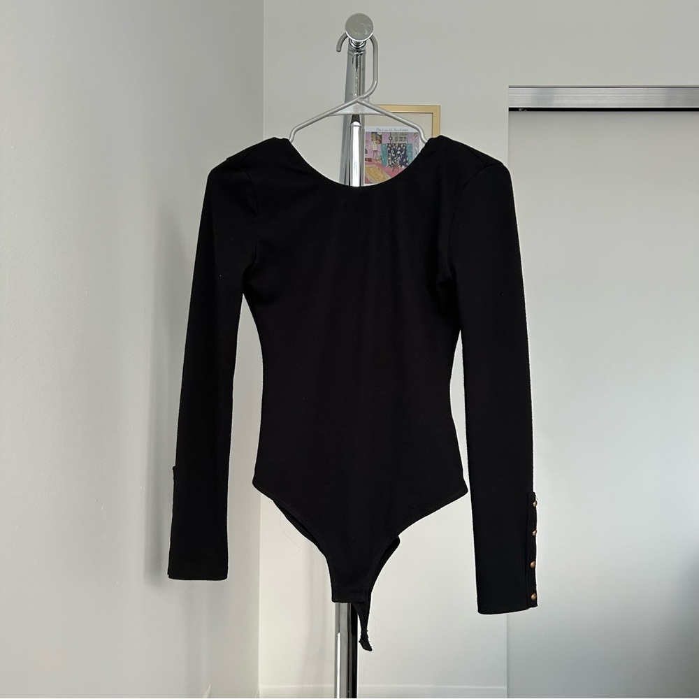 Black backless body suit